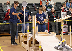 Students from Arnett compete in the final round of the Heartland BEST Robotics Game Day Contest.