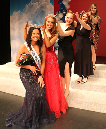 Former title holders celebrating the crowning of Miss Northwestern