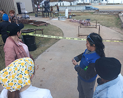 Northwestern Visual Arts students Lilith Ferrero, Katelyn Findley and Rose Negelein attend an Iron Art Works Pour at the University of Oklahoma.