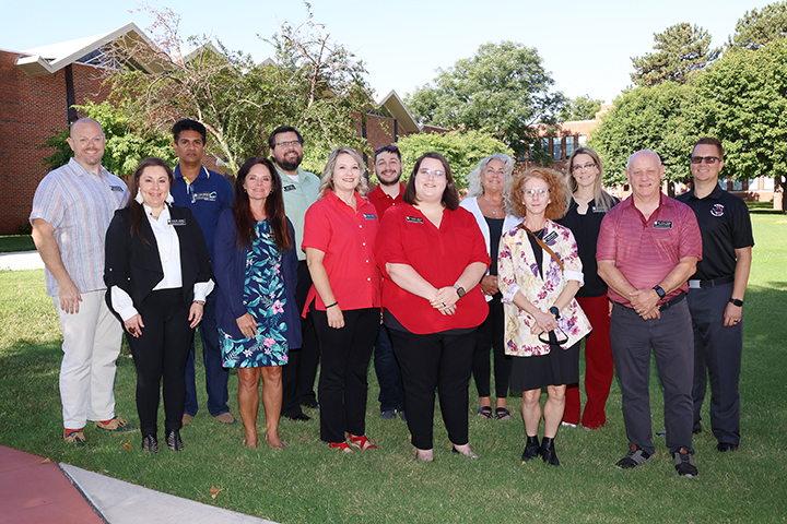 Northwestern’s new faculty members who attended a recent orientation session before the start of the fall semester include (back row, left to right): Derrick Bready, Dr. Rasika Mohottige, Jared Cole, Dr. Adam Alber, Dr. Angela Skousen, Taylor Phillips, and Dr. Zach Tolman; (front row, left to right): Natalie Adams, Dr. Sandra Scott Watson, Danielle Budy, Sarah Martin, Dr. Theresa McBride, and Dr. Ryle Kiser.