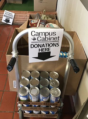 image of food donations at a basketball game