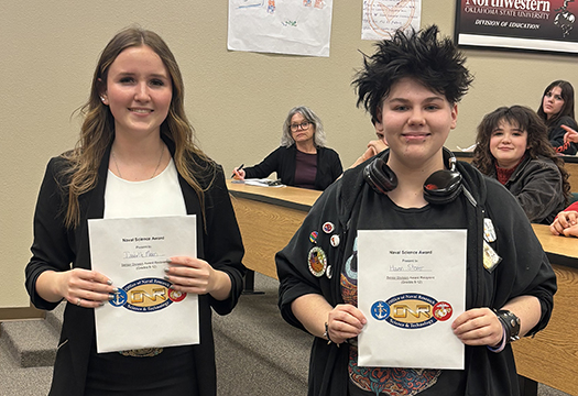 image of Isabelle Mason and Haven Stoner holding certificates presented at the Science Fair at NWOSU.