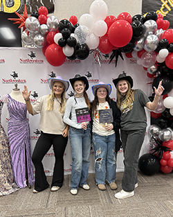 A group of shoppers strike a pose at the 11th annual Primp for Prom event at Woodward High School.