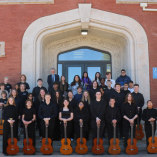 Participants in the 2024 Guitar Festival pose outside Ryerson Hall with Max Ridgway, Northwestern Oklahoma State University adjunct instructor of music. 