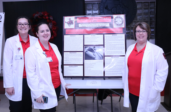 (Left to Right) Briana French, Kaitlin Jones and Jessellen Frantz won first place in the Nursing category of poster presentations for their project titled, “Spirituality in End-of-Life Care.”