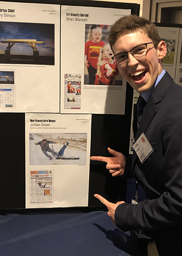 Northwestern News editor-in-chief Jordan Green stands by his award-winning feature photograph during the 2021 Oklahoma Press Association's annual awards convention June 12 in Oklahoma City.