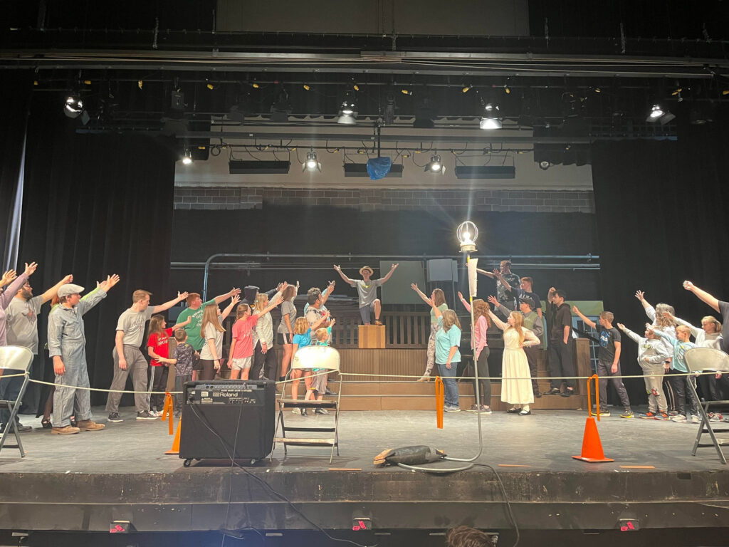 Cast members rehearse choreography to a scene from the upcoming musical “The Music Man” at Northwestern. The show will take place in Herod Hall Auditorium on April 7-8 at 7 p.m. and April 9 at 2 p.m.