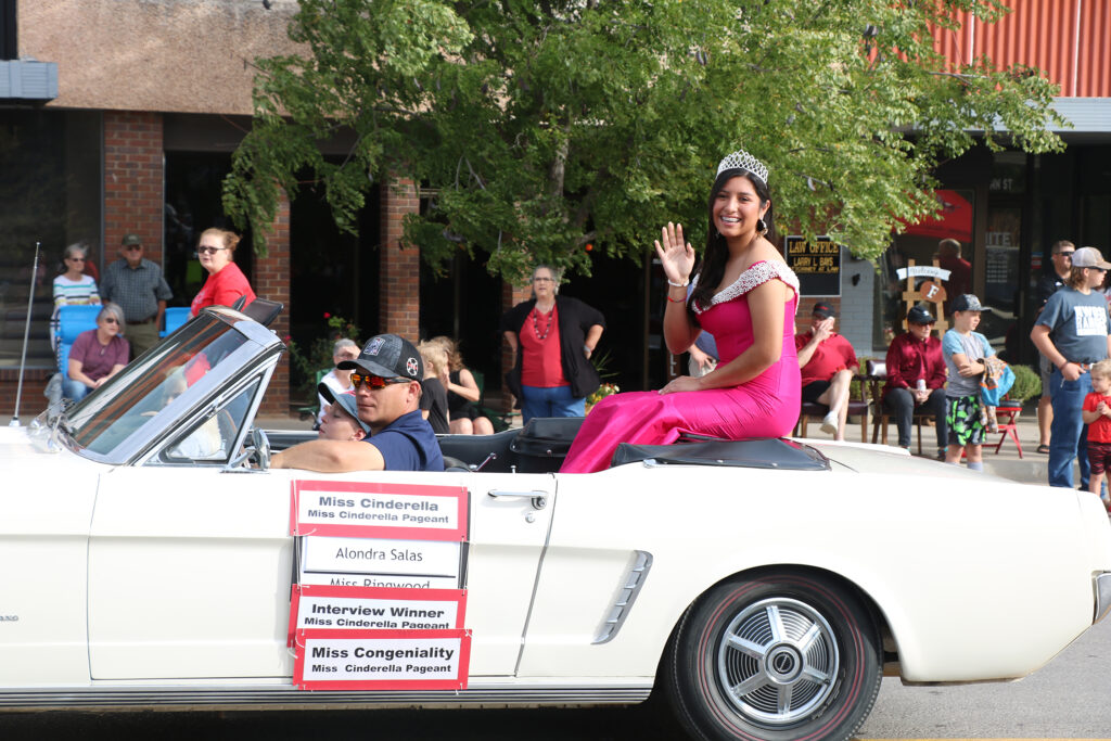 Winner of the Miss Cinderella 2021 pageant, Alondra Salas of Ringwood, waves to the crowd during Northwestern Oklahoma State University’s 2021 Homecoming Parade.