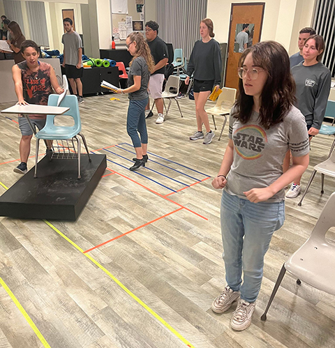 Cast members rehearse choreography for a scene from the upcoming musical “Zombie Prom” at Northwestern. The show will take place in Herod Hall Auditorium on Oct. 6-7 at 7 p.m. and Oct. 8 at 2 p.m.
