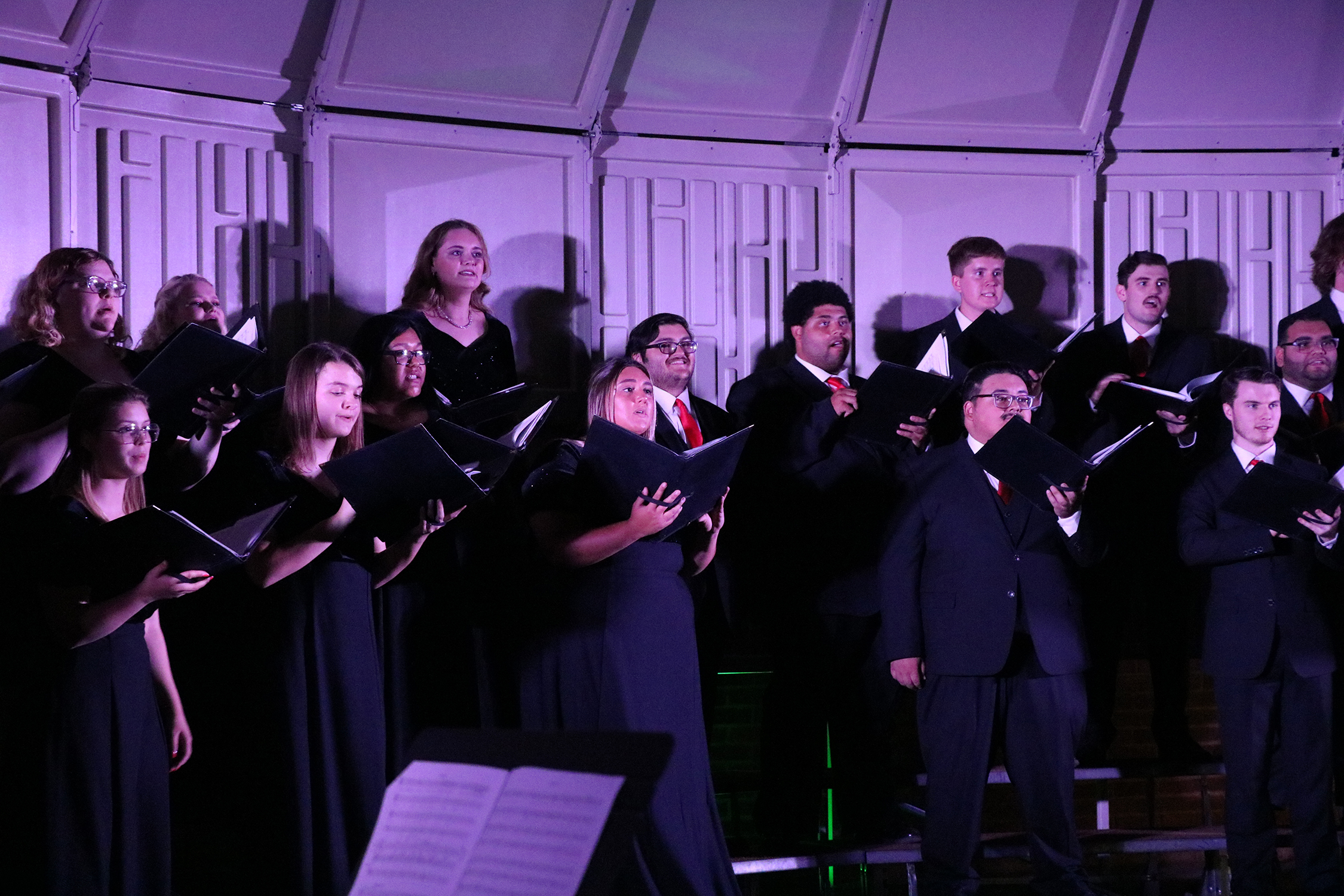 Members of the University Singers at Northwestern Oklahoma State University perform at the spring Soundscapes concert at the Alva Bus Barn. Members of the community can join these singers by participating in the Concert Choir each Monday evening in the J.W. Martin Library Annex.